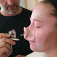 Latex pig nose glued on is made up